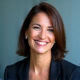 Professional portrait of Claudia Romano, CEO